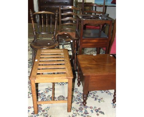 A late-Georgian mahogany wash stand, with pierced upper tier, central drawer and square legs, 38cm wide, a rectangular mahoga