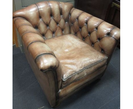 A pair of modern leather button upholstered armchairs (2)  