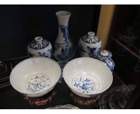 A pair of Chinese blue and white meiping, another vase, two bowls with stands, a Chinese tea caddy etc  