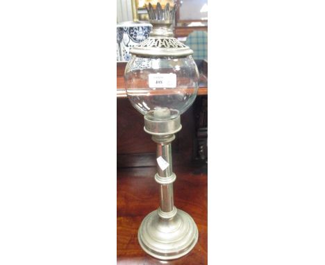 A glass mounted candle holder and a cranberry shaded oil lamp converted to electricty (2)  