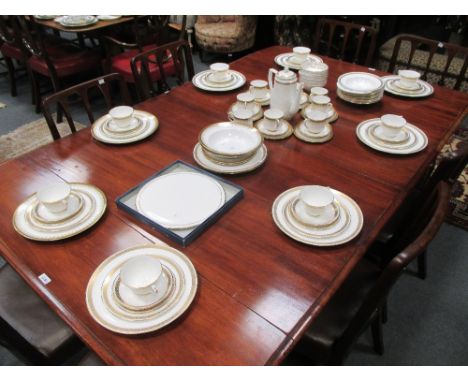 A Royal Worcester Golden Anniversary pattern tea and dinner service for 8 settings, a Paragon 6 setting tea service of simila