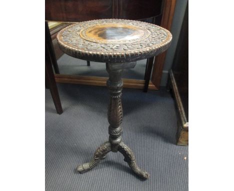 An Indian tripod table with fragmentary label for Walsh & Co. 65 x 30cm  