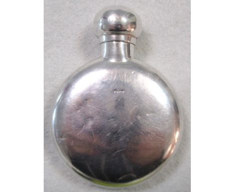 A small Victorian silver scent bottle by L Spiers, Birmingham 1886, the flat flask shaped body plain below a hinged ball cap,