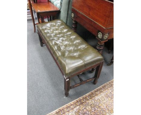 An Aesthetic period rosewood organ stool, the angled green leather button upholstered seat above a reeded frieze and legs uni