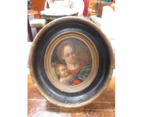Follower of Francesco Solimena   The Madonna and Child oil on panel, oval, in an ebonised and gilded contemporary frame 14 x 