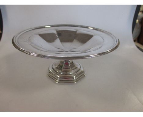 An Edward VII silver standing dish by Walker and Hall, raised on an octagonal base, the bowl with panel decoration, Sheffield