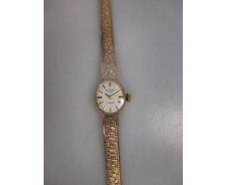A lady's 21 jewel 'Rotary' wristwatch cased in 9ct, London 1970, with integral bracelet terminating in a fold over ladder cla