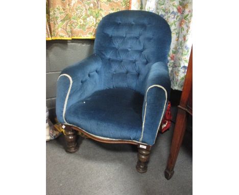 An early Victorian button back easy chair  
