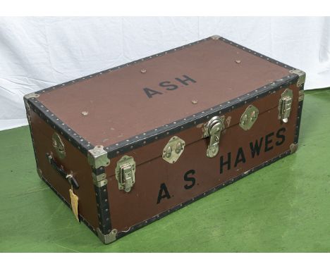 A large travel trunk