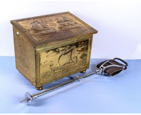 A brass coal/log box and a shooting stick