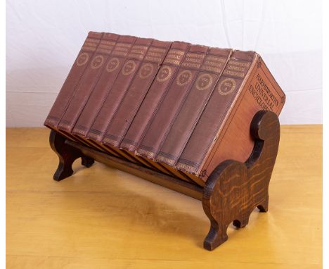 Oak book trough 49cm wide with a set of Harmsworth Universal Encyclopaedia