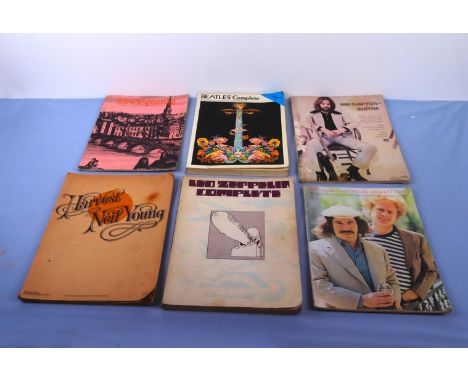 Six music for guitar books, Beatles Complete,  Eric Clapton, Neil Young Harvest Moon, LED Zeppelin Complete, Simon &amp; Garf