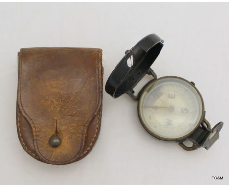 A 1945 WW2 US Army Corps of Engineers Lensatic compass in its leather case. Manufactured by Superior Magneto Corp of New York