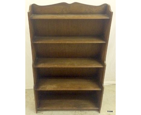 A mahogany waterfall four shelf bookcase. 120 x 73cm