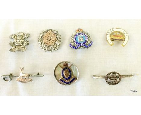 A collection gold on silver military Sweetheart brooches to include Herts Yeomanry 9ct gold on silver sword, York and Lancast