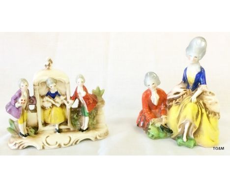 A pair of Goebel 1935 courting figurines with rare printed and impressed double crown marks