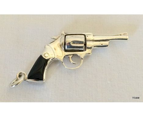 A Silver Miniature Pistol with Enamel Handle.