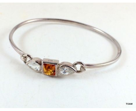 A silver and Amber set bangle