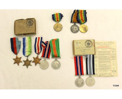 Four lots of medals belonging to the Smith family name, comprising a WW1 Victory Medal named to 8741 Bombardier G Smith of th