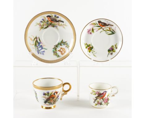 A LARGE ROYAL WORCESTER CUP AND SAUCER (4)Circa 1875
Attributed to John Hopewell, each painted with a bird amongst thistles a