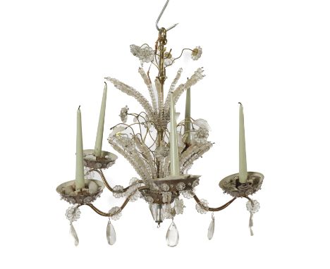 A FRENCH GILT AND BRASS MOUNTED GLASS FIVE LIGHT CHANDELIERMid-20th Century 
Of cartouche outline, mounted with strings of fa