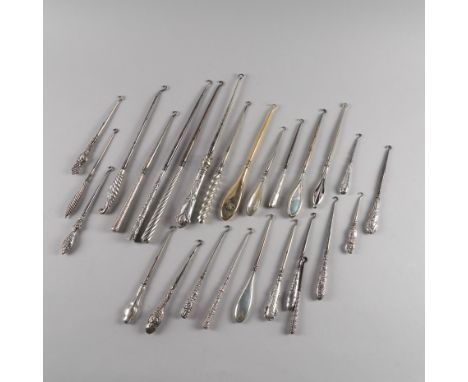 A COLLECTION OF SILVER HANDLED BUTTON HOOKS (26)Mostly Birmingham examples, the longest measuring 33cm, the shortest measurin