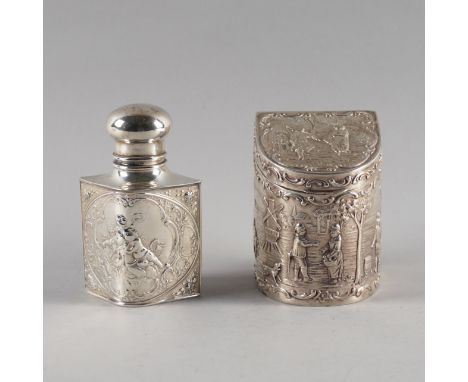 A GERMAN SCENT BOTTLE AND A EUROPEAN TEA CADDY (2)The scent bottle embossed with putto within floral scrolls and with a pull 