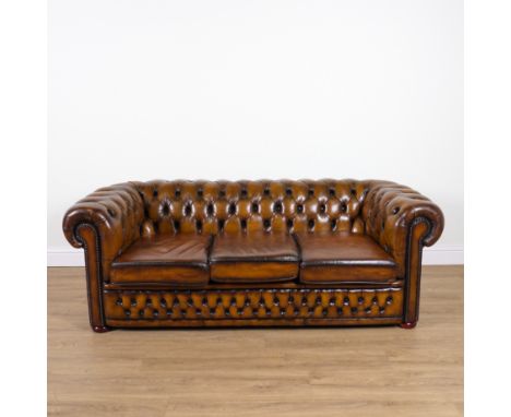 A MODERN BROWN LEATHER BUTTON UPHOLSTERED CHESTERFIELD SOFA200cm wide; 70cm high