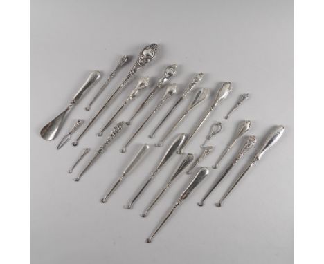 A COLLECTION OF TWENTY BUTTON HOOKS AND TWO FURTHER ITEMS (22)Including a silver handled button hook detailed Tiffany & Co st