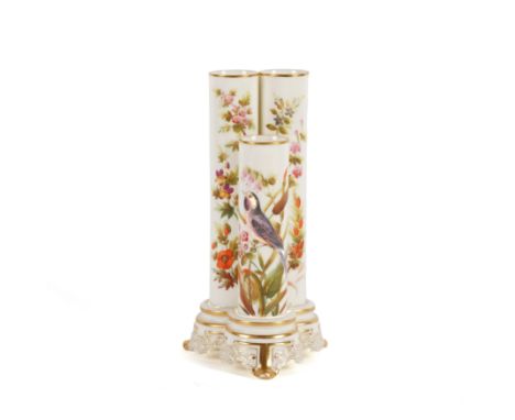 A ROYAL WORCESTER TRIPLE TUBE VASECirca 1880
Attributed to John Hopewell, painted with a bird amongst flowers, green printed 