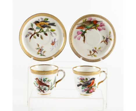 A PAIR OF ROYAL WORCESTER CUPS AND SAUCERS (4)Circa 1875
Attributed to John Hopewell, painted with birds in branches inside g