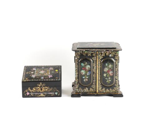 A VICTORIAN MOTHER OF PEARL INLAID FLORAL POLYCHROME PAINTED PAPIER MACHE TABLE CABINET (2)The pair of doors enclosing four d