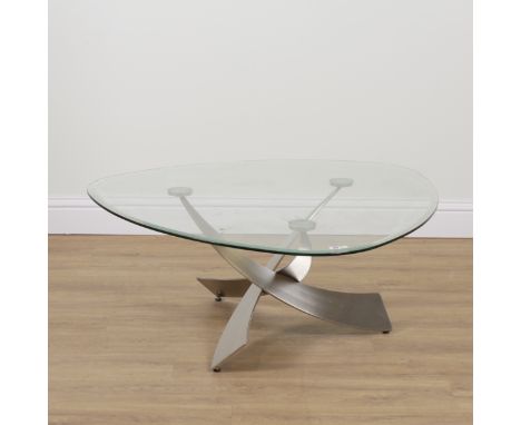 A MODERN BEVELLED GLASS PLECTRUM SHAPED COFFEE TABLEOn three polished metal supports, 112cm wide; 45cm high