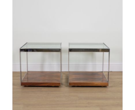 MERROW ASSOCIATES; A PAIR OF MID-20TH CENTURY CHROME AND GLASS SQUARE SIDE TABLES (2)Over rosewood bases, 55m wide; 53cm; 53c