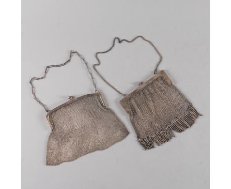 TWO SILVER CHAIN MESH PURSES (2)The first with floral and foliate pierced decoration to the top, the bottom with fringe bead 