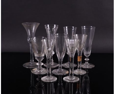 A GROUP OF NINE VARIOUS DRINKING GLASSES (9)18th -20th century
Comprising of three plain-stemmed liqueur glasses engraved wit