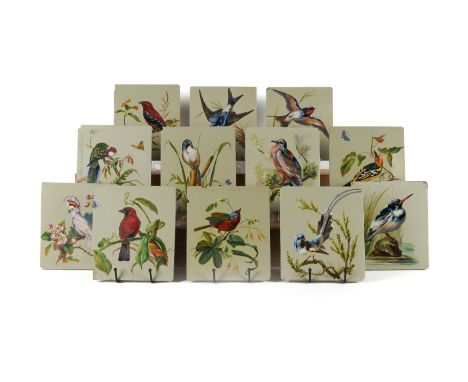 A GROUP OF TWENTY THREE EARTHENWARE TILES (23)Late 19th century
Square or rectangular form, each painted with a birds study o