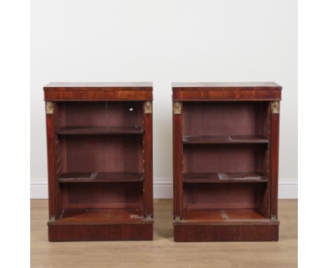 A PAIR OF EMPIRE REVIVAL GILT METAL MOUNTED MAHOGANY FLOOR STANDING OPEN BOOKCASES  (2)With Egyptian caryatid columns, 67cm w