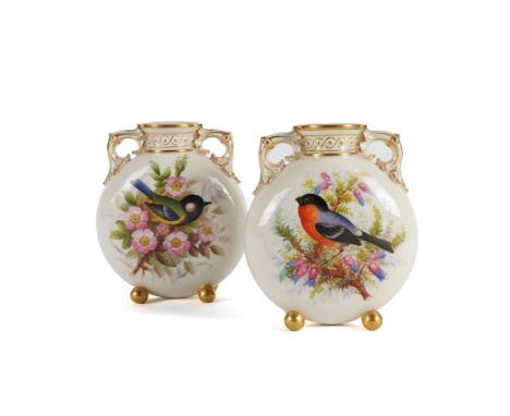 A PAIR OF ROYAL WORCESTER PILGRIM FLASKS (2)Circa 1878
Attributed to John Hopewell, painted each side with birds amongst flow
