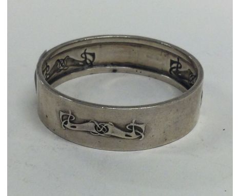 LIBERTY & CO: A silver bracelet / napkin ring. Birmingham 1910. Approx.18  grams. Est. £50 - £80.