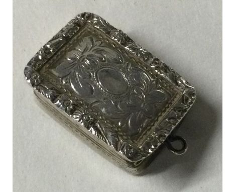 A Victorian engine turned silver vinaigrette  Birmingham 1860. By Edward Smith. Approx. 7 grams. Est. £80 - £120.