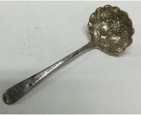 A good Georgian silver ladle with embossed decoration. Approx. 56 grams. Est. £20 - £30.
