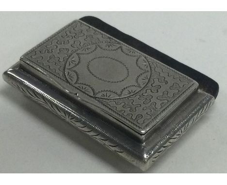 A Victorian silver chased hinged snuff box. London 1898. Approx. 27  grams. Est. £50 - £80.