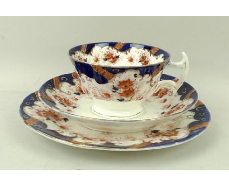 A late Victorian Collingwood part tea service, decorated in the 'Cairo' pattern with transfer design over painted with cobalt