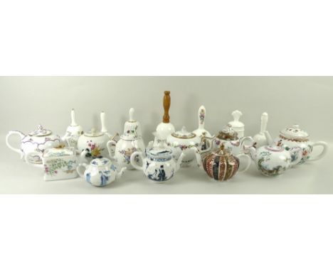 A collection of eleven Victoria and Albert museum teapots, Franklin mint with eleven certificates, together with a collection