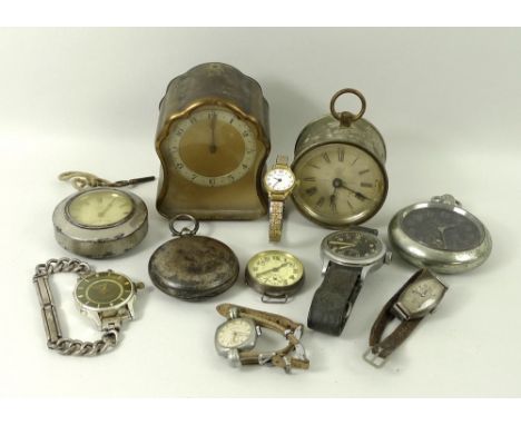 A collection of vintage clocks and watches, comprising a black faced Lemania military wristwatch, with Arabic numerals, subsi