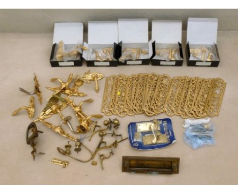 A collection of modern brass door furniture, including French style gilded handles, door knockers, a letter box, a group of s