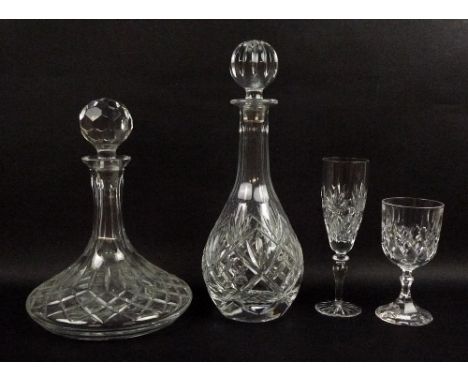 A collection of cut glass items, comprising a Royal Doulton cut glass decanter, 33cm, a Caithness faded cranberry glass vase,