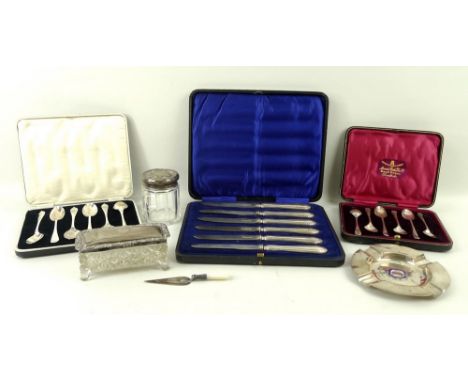 A set of six silver teaspoons, Sheffield 1912, another set, Sheffield 1956, both cased, a set of six silver fruit knives, She
