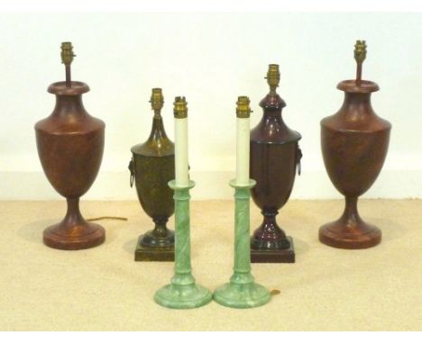 A group of four painted metal baluster shaped table lamps including a pair of brown, 18 by 51cm high, one mottled red with li